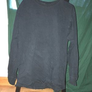A woman’s black long sleeve